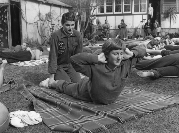 Pat Hungerford and Lorraine Crapp calisthenics in Thicknesse backyard, 1955